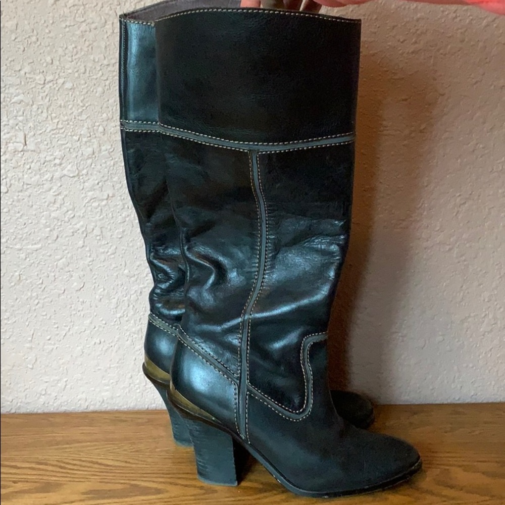 Black leather cowboy style boots